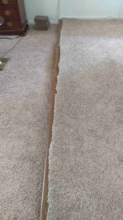 picture of carpet that has been installed incorrectly